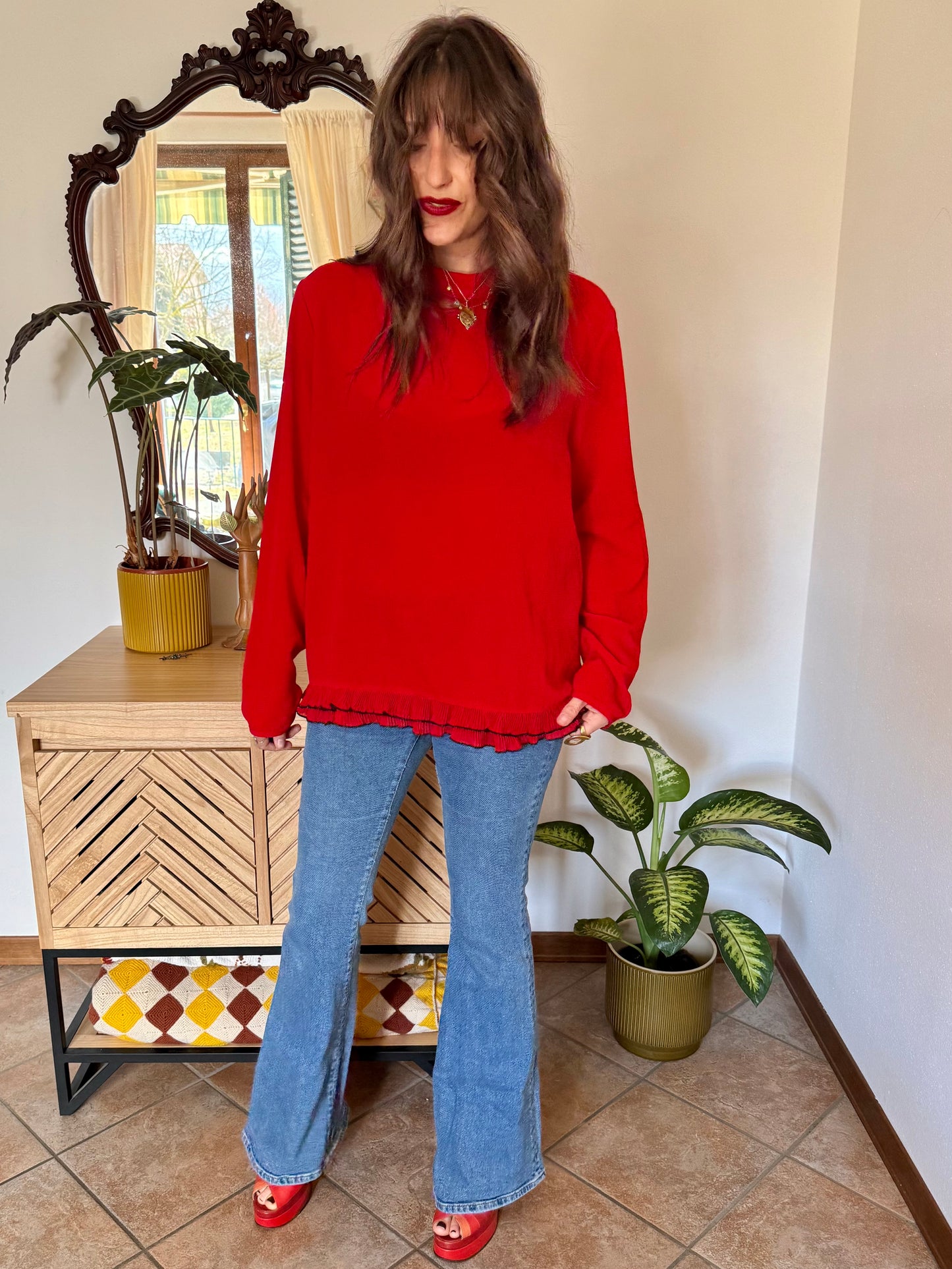 1980's vintage cherry red textured blouse with black ruffle hem