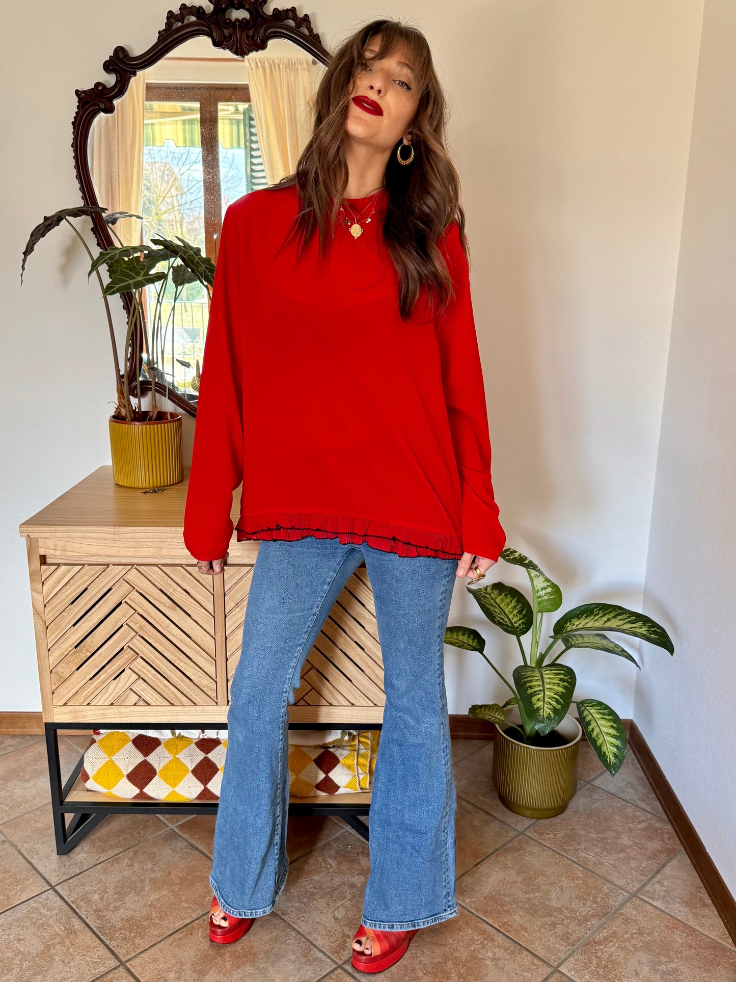 1980's vintage cherry red textured blouse with black ruffle hem