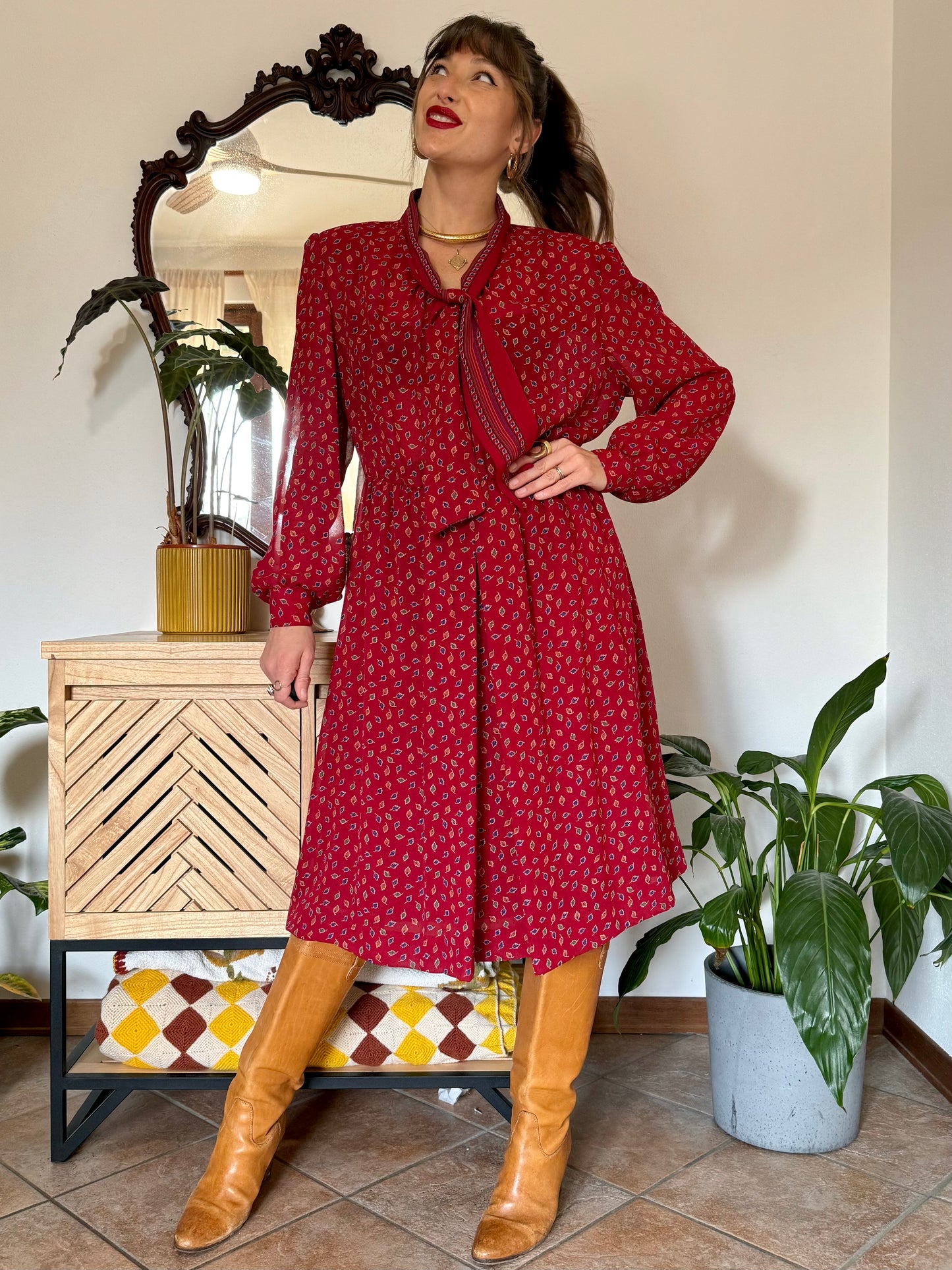 1970's vintage dark red bow tie dress with blue, green and orange leaf print midi dress