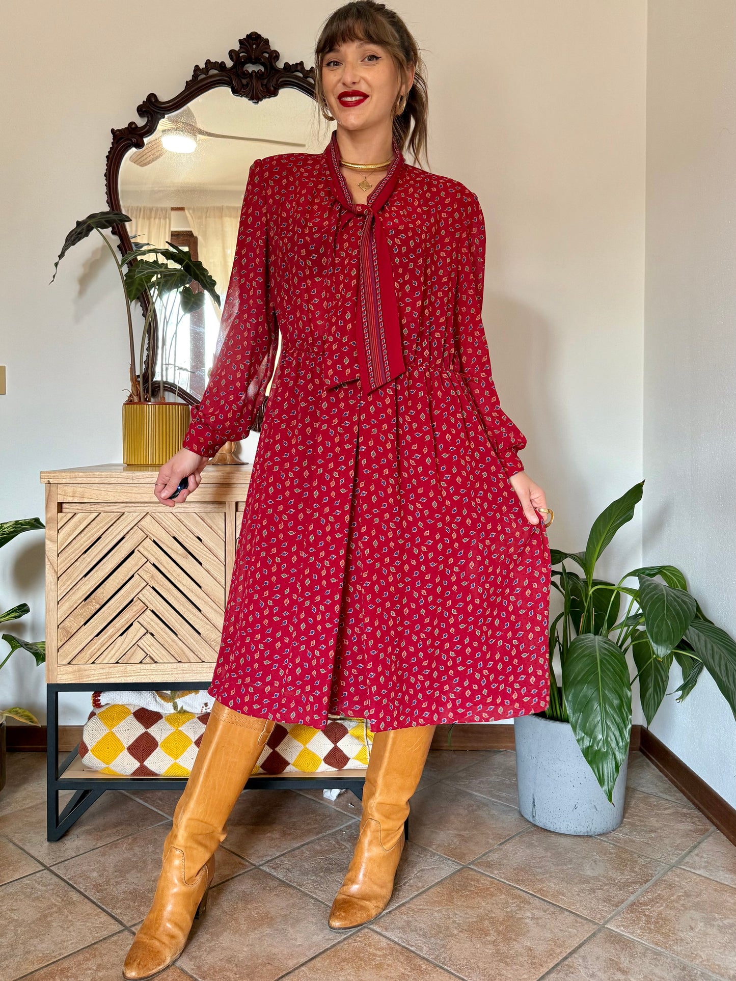 1970's vintage dark red bow tie dress with blue, green and orange leaf print midi dress