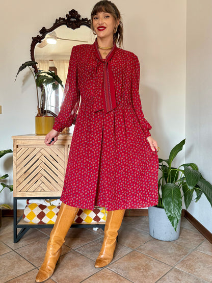 1970's vintage dark red bow tie dress with blue, green and orange leaf print midi dress